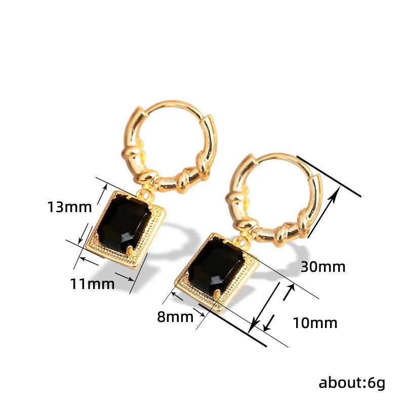 Geometric copper earrings with black zircon accents in quadrilateral design