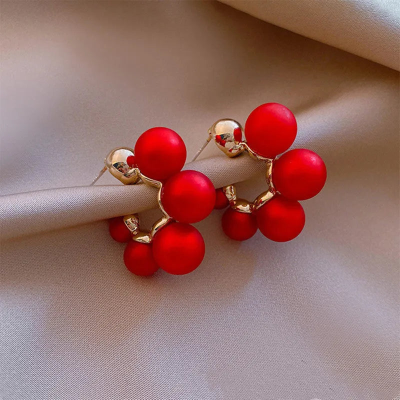 Red bell-shaped alloy earrings with 3.5cm drop length and adjustable butterfly clasps