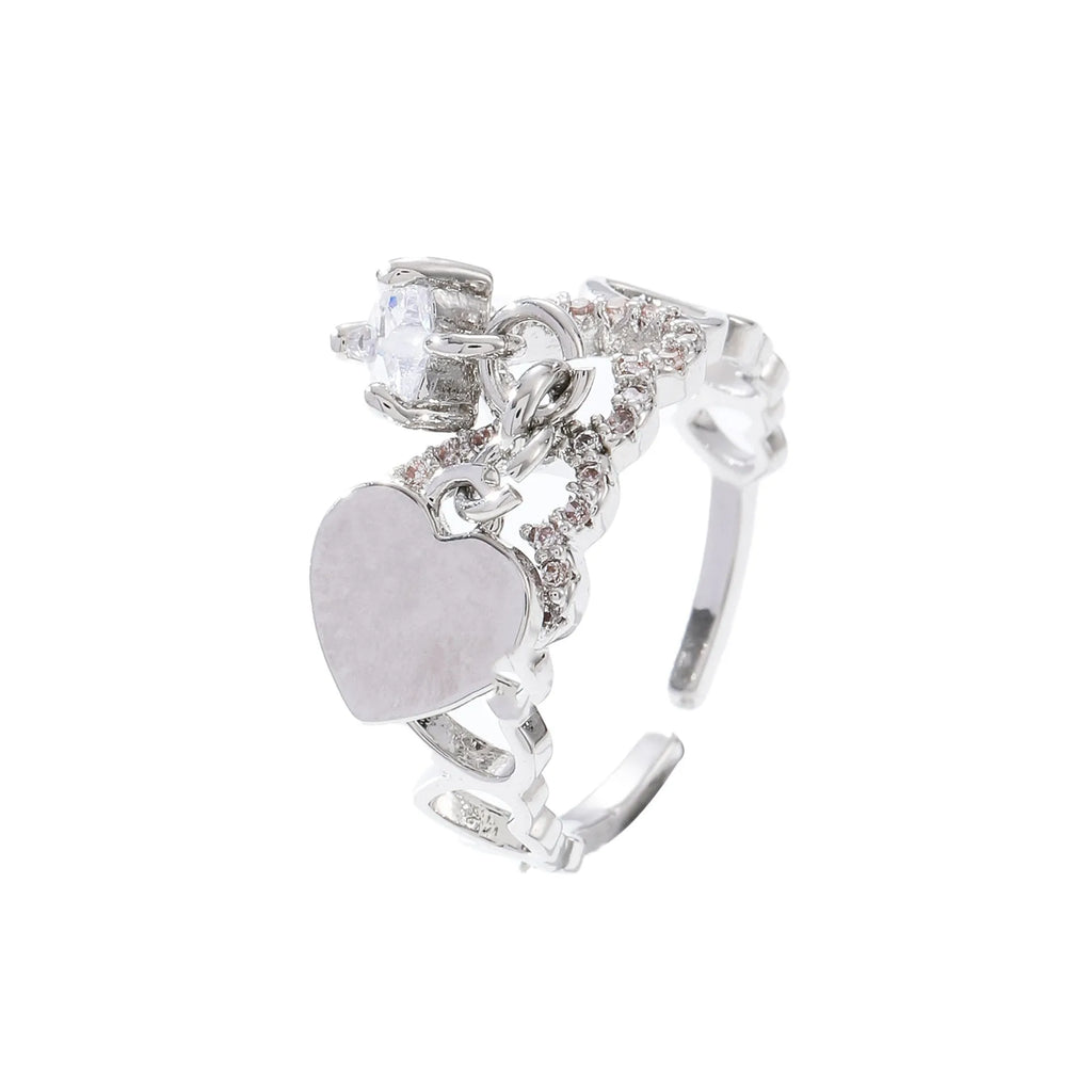 Heart-shaped open ring in white K electroplated copper with love-heart design and adjustable band