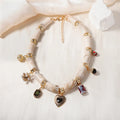 Heart-shaped plastic/resin pendant necklace with electroplated finish in picture colour
