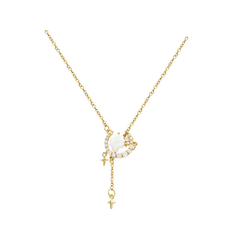 Women's star and moon pendant necklace with zirconium details on adjustable copper clavicle chain