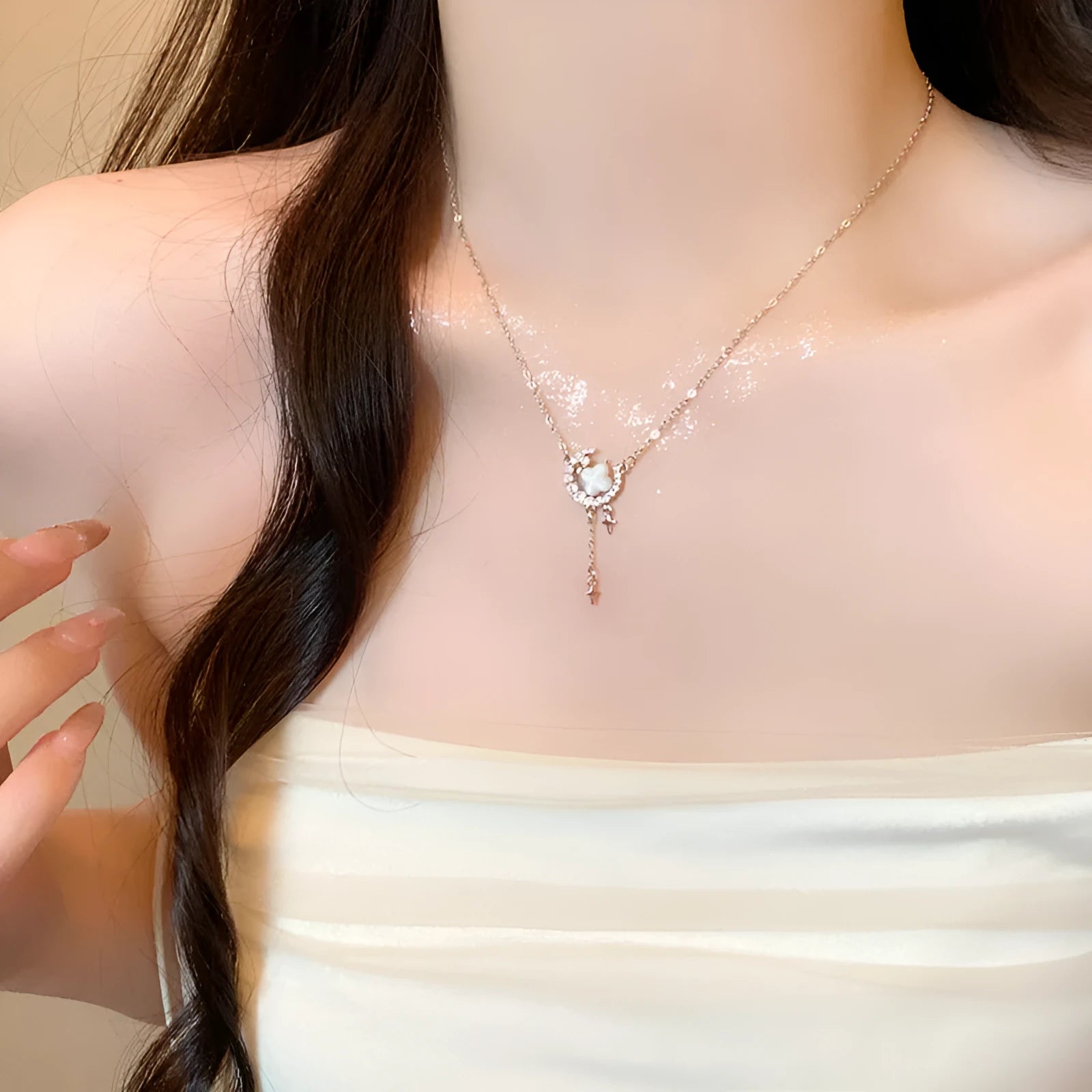 Women's star and moon pendant necklace with zirconium details on adjustable copper clavicle chain
