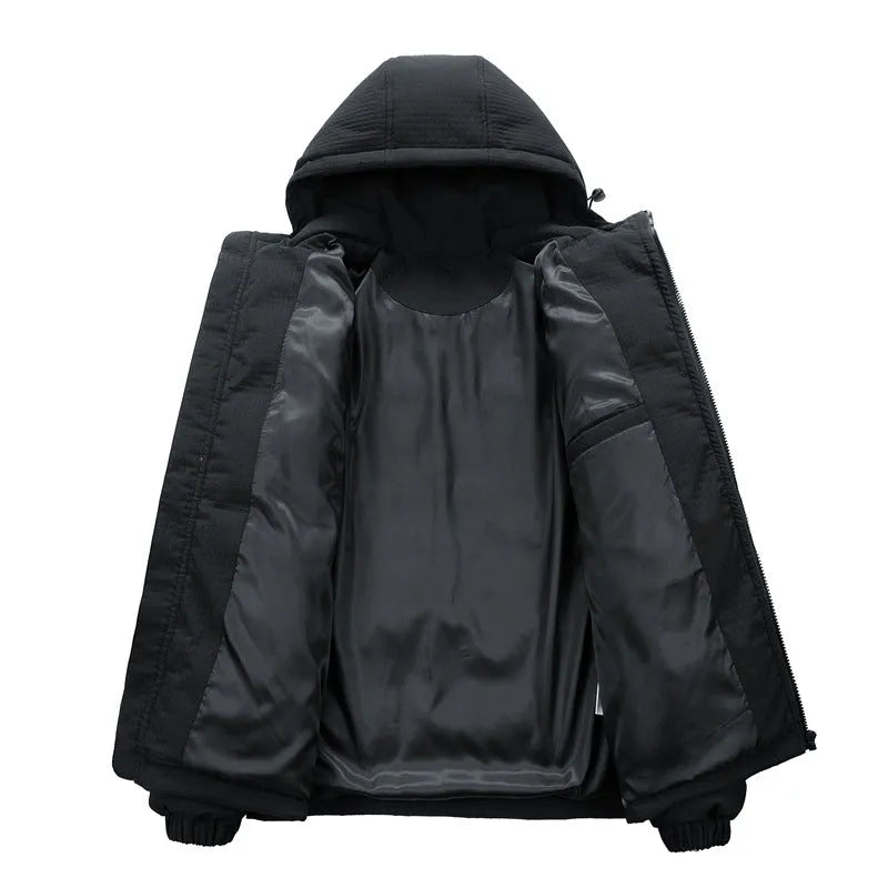 Man wearing a black Korean-style hooded cotton-padded winter coat with side pockets.