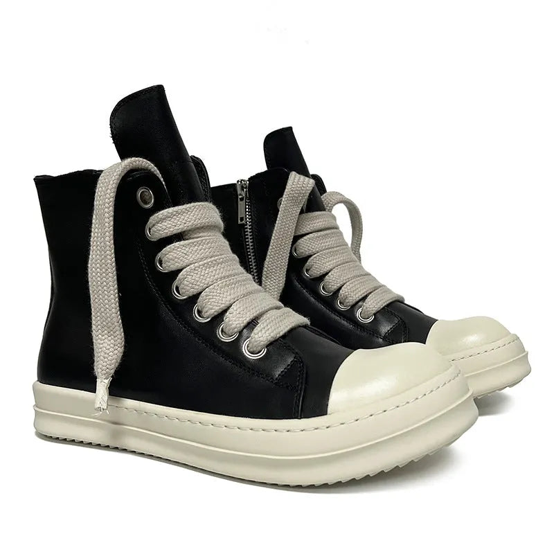 High-top leather sneakers with side zipper in black, showing platform heel and stitching details