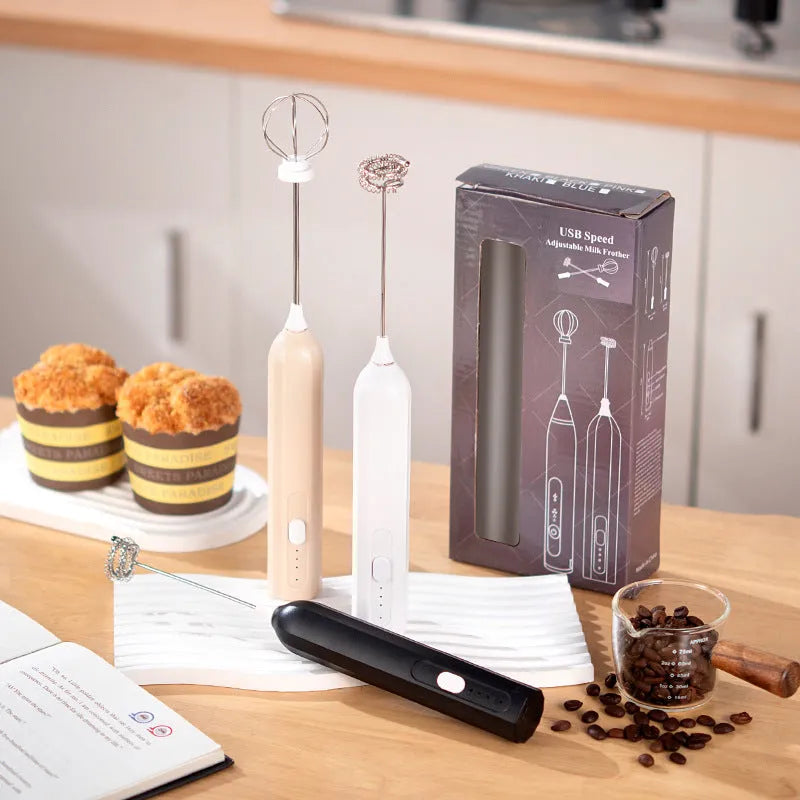 USB rechargeable handheld electric whisk in apricot colour with whisk attachment