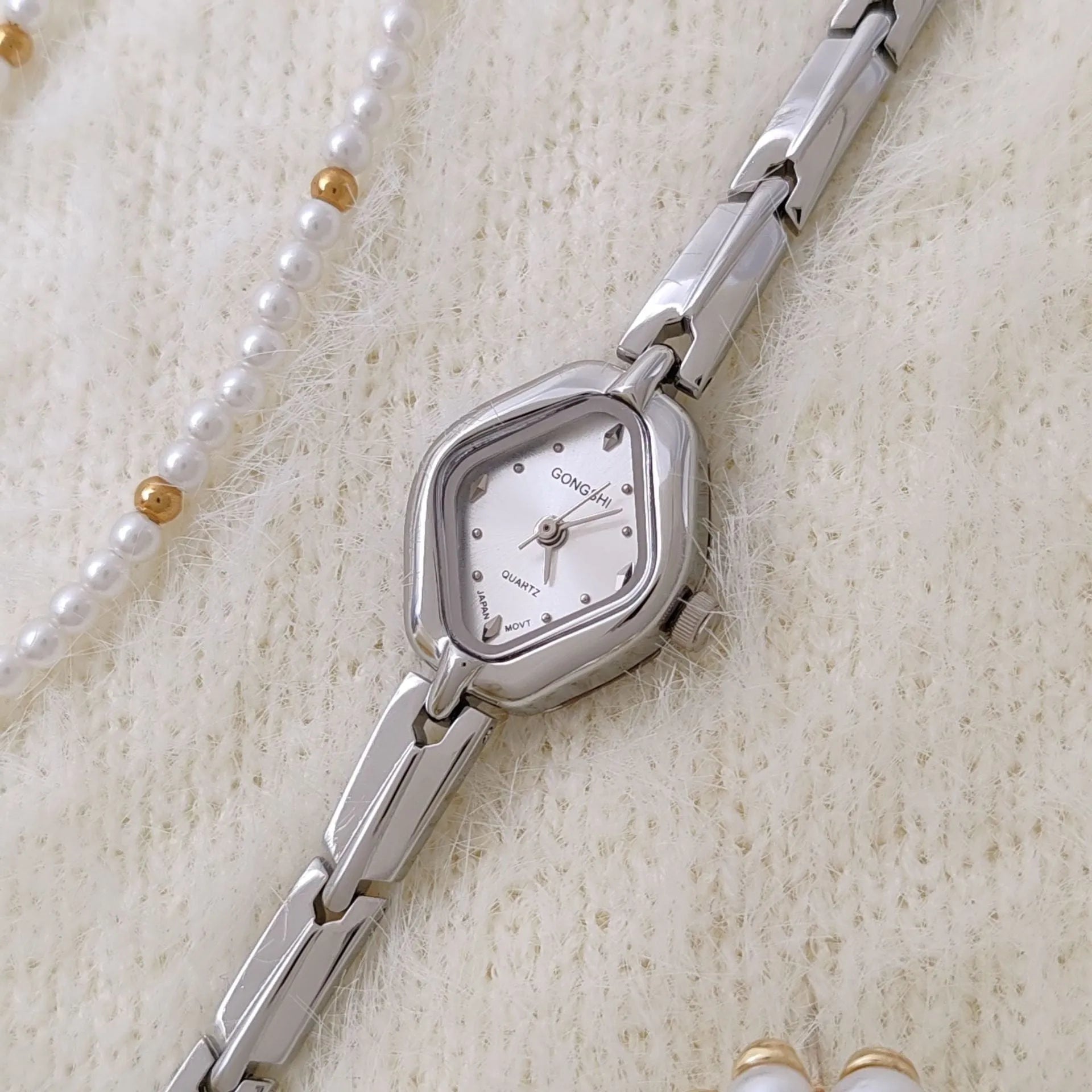 Women's gold or silver diamond bracelet watch with 18mm dial and chain strap