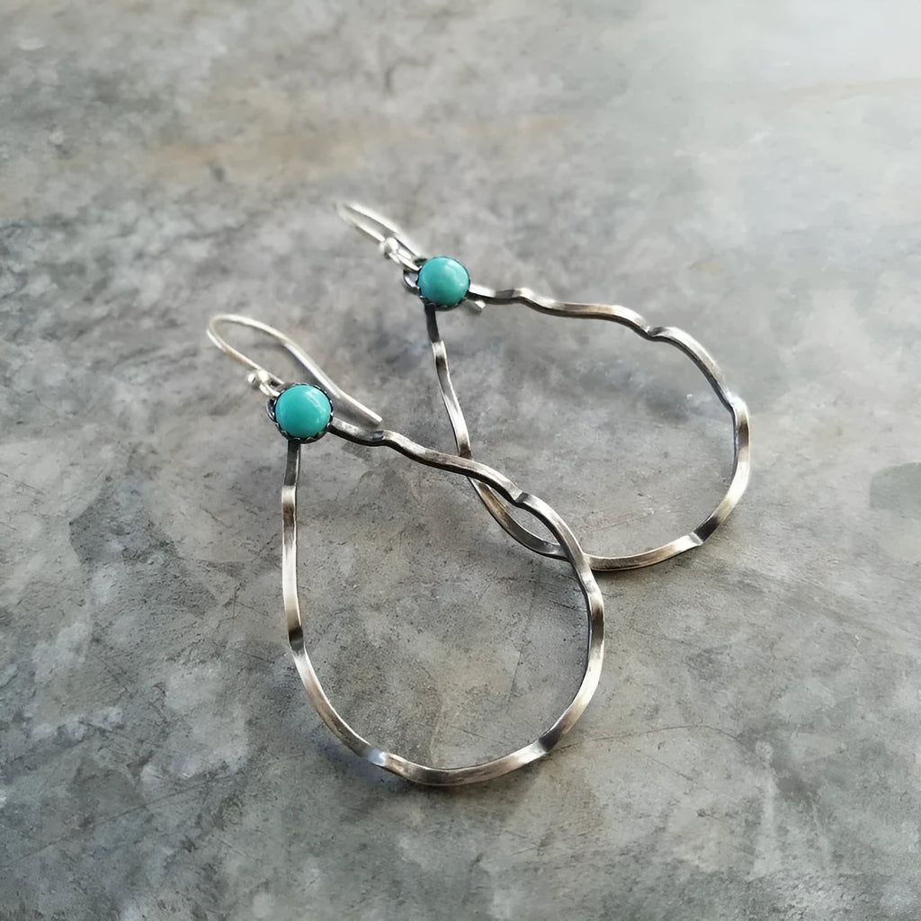 Geometric circle earrings with antique silver finish and turquoise accents in Bohemian style