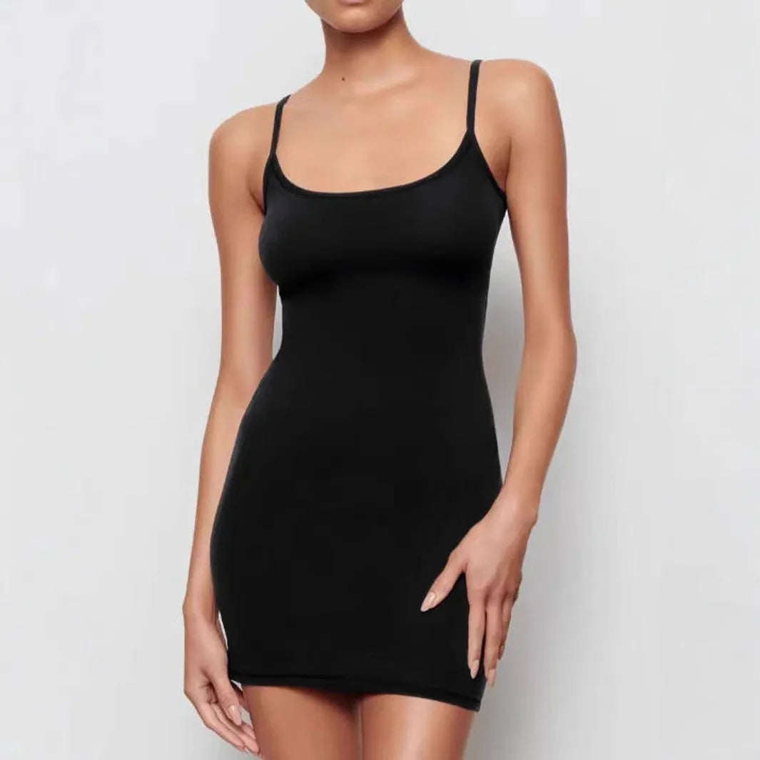 Black sling dress with sheath silhouette, sleeveless design, and short skirt length made from 100% polyester fabric