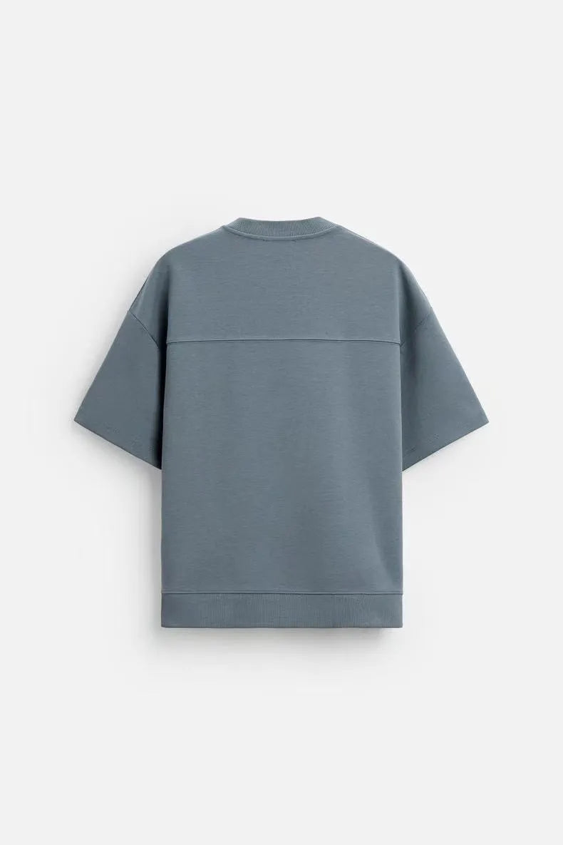 Loose double-sided cloth texture short sleeve top with matching shorts in round collar design, available in white, black, military green, and blue colour options