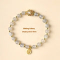 Hand-woven crystal bracelet with grey moonstone, pink sunstone, and peach strawberry quartz 6mm beads