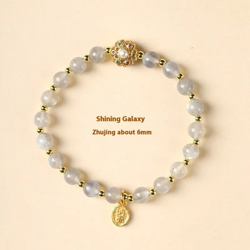 Hand-woven crystal bracelet with grey moonstone, pink sunstone, and peach strawberry quartz 6mm beads
