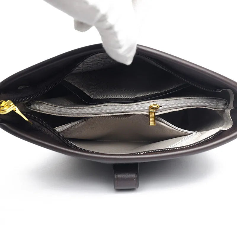 Soft black PU leather bucket bag with double shoulder straps and multiple compartments