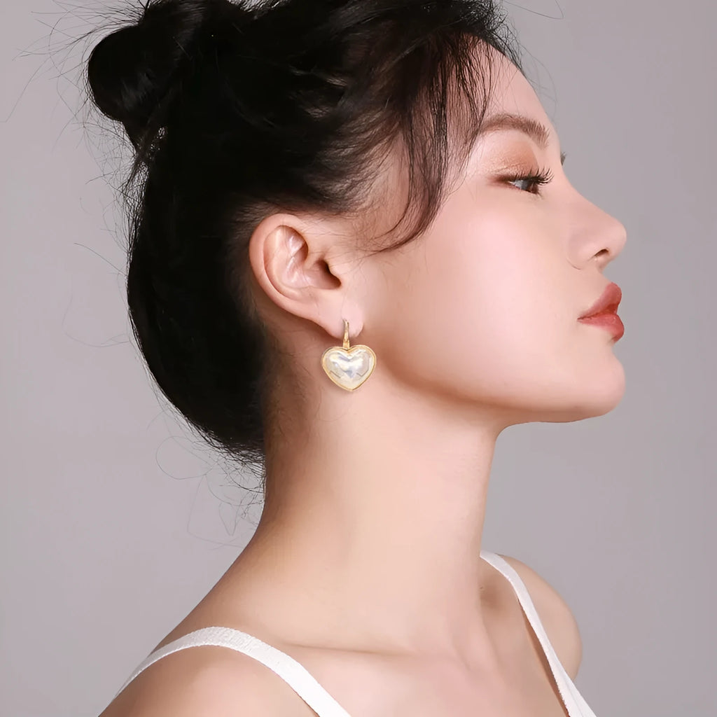 Gold coloured summer love design alloy ear clips for women.