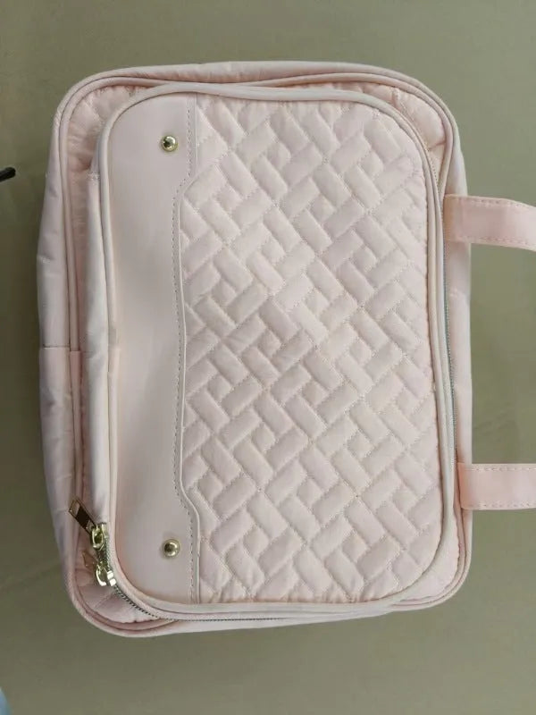 Black hanging waterproof cosmetic bag with hook showing 30.5cm width for travel storage
