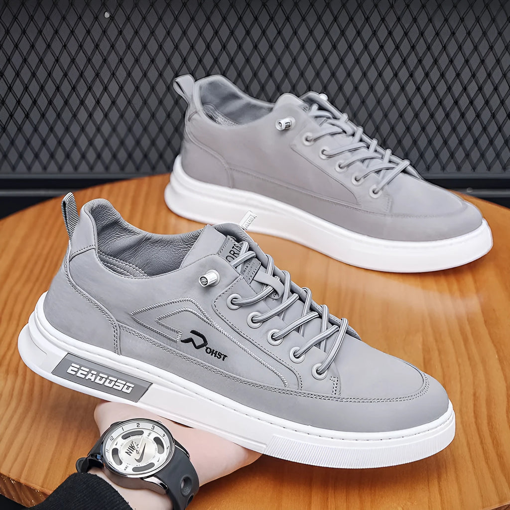 Grey men's canvas casual shoes with round toe and front lace-up design