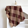 Cashmere-like scarf with tassel detailing in brown colour, showing 185x65cm dimensions