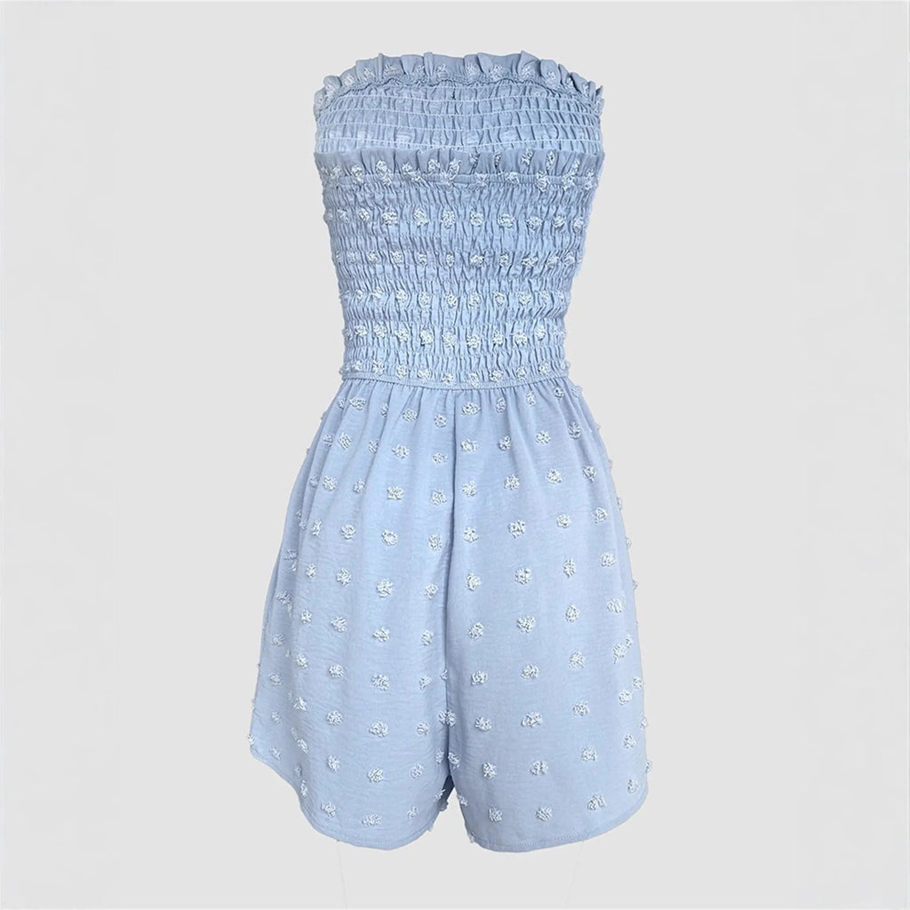 Women's blue off-shoulder sleeveless jumpsuit with button detail and mid-waist design on mannequin