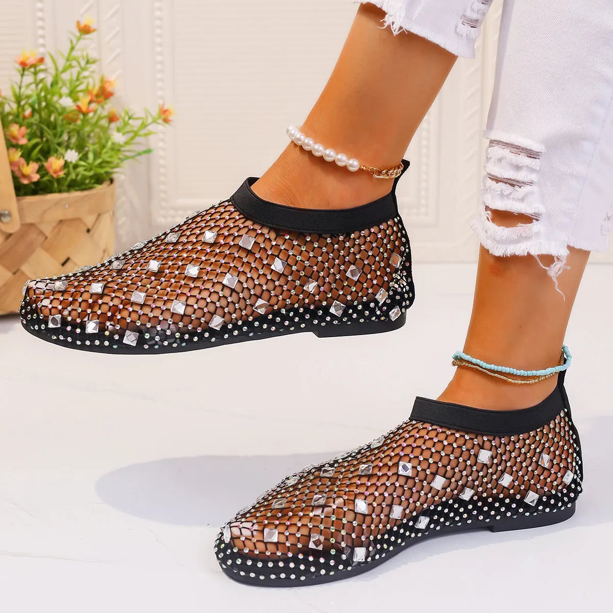 Women's mesh flat sandals with colourful rhinestone design on round toe, showing rubber sole and breathable upper