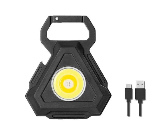 Black aluminium alloy keychain light with magnetic base and foldable handle, measuring 6 cm by 4.2 cm