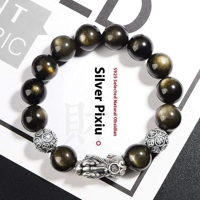 Men's geometric obsidian bracelet in sterling silver showing polished finish and natural stone detailing