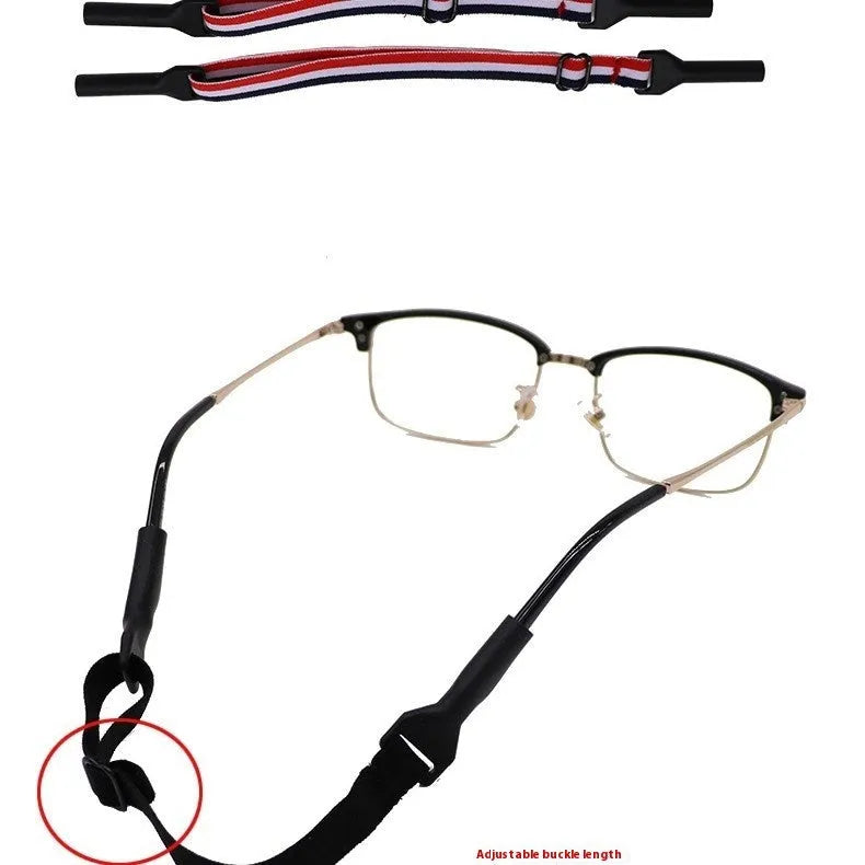 Black adjustable glasses cord with silicone earpiece tips on spectacles
