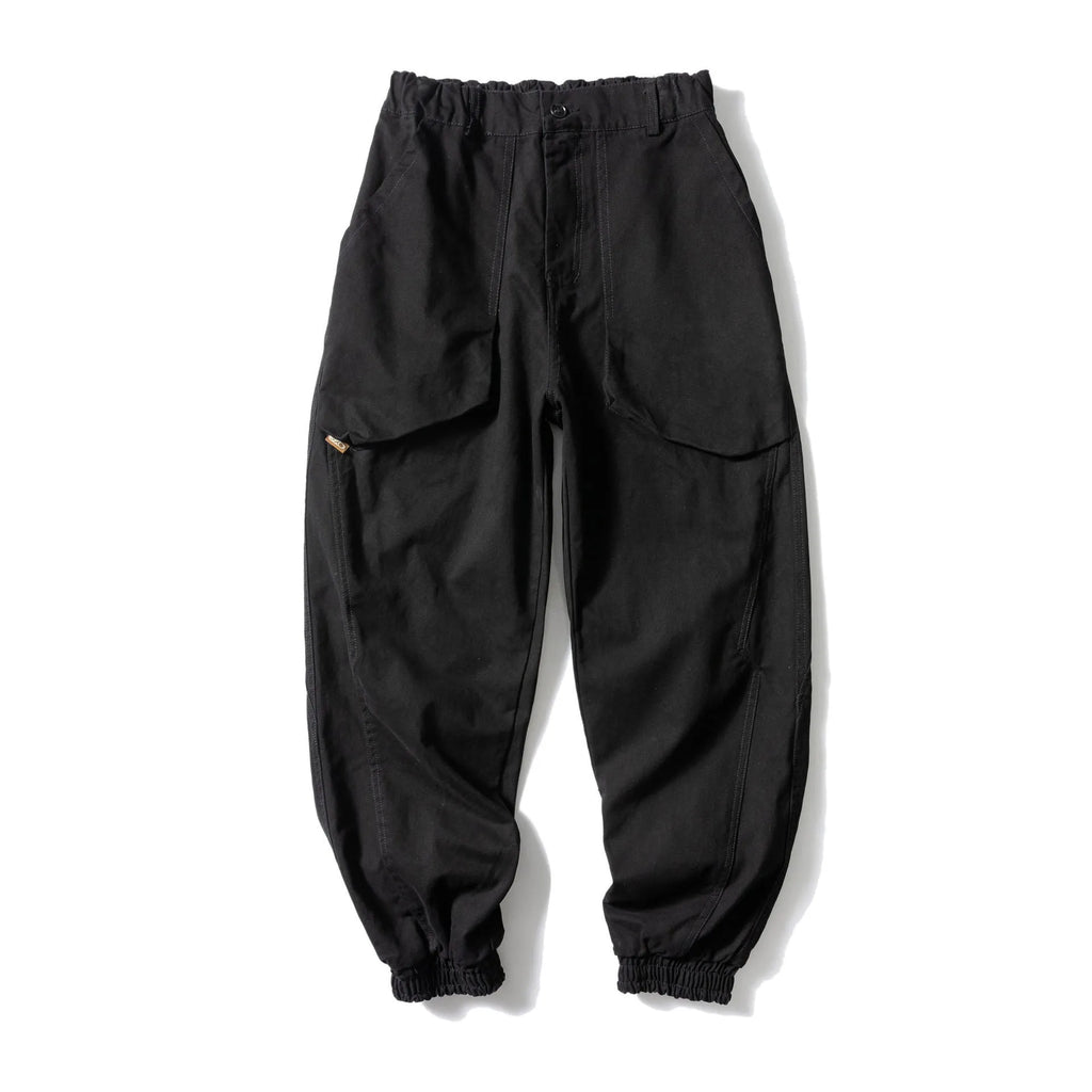 Cotton casual trousers with large side pockets and tapered legs in black colour