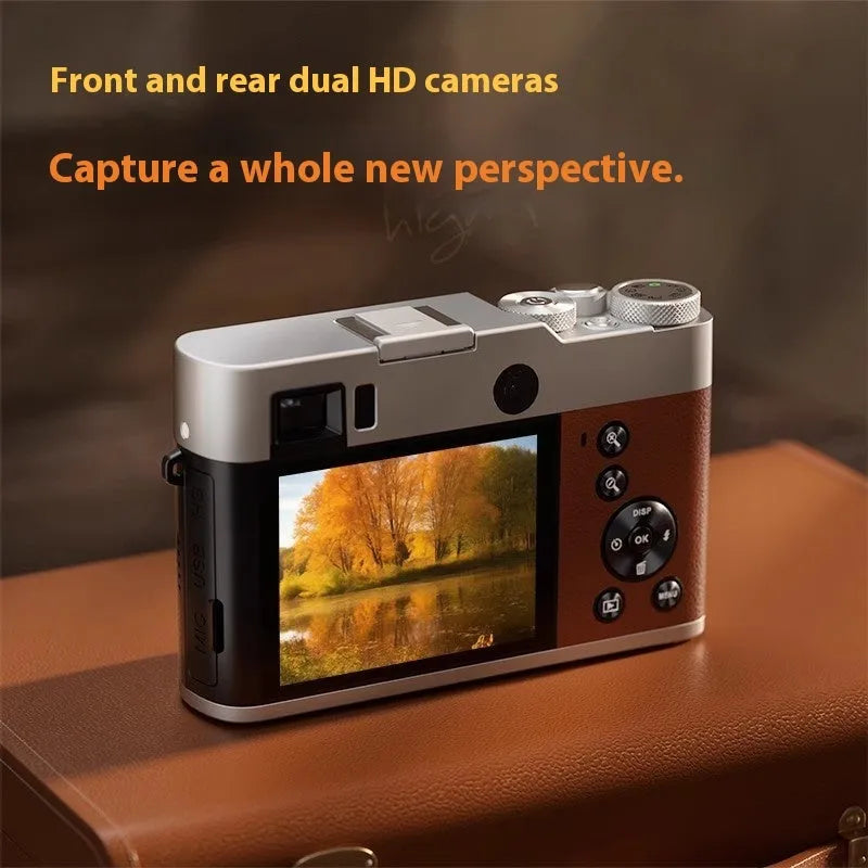 Black 5K HD digital camera with dual lenses, optical viewfinder, and 2.88-inch display screen on a table