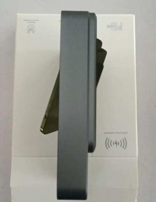 MagSafe magnetic wireless power bank for iPhone 14 in purple, showing slim profile and square aluminium alloy design.