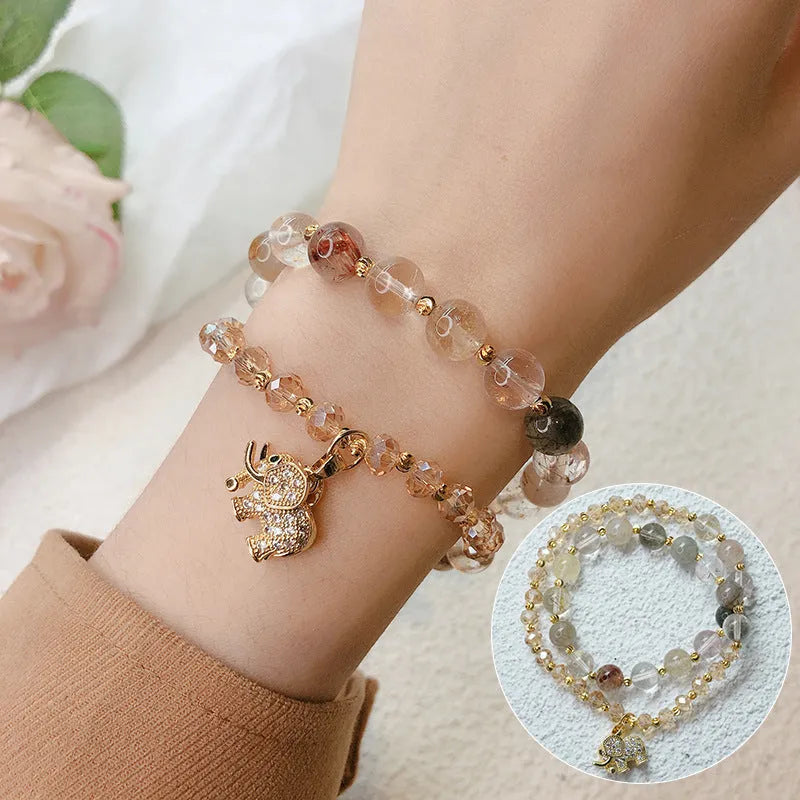 Women's retro bracelet with colour hair crystal and strawberry quartz stones in ethnic design