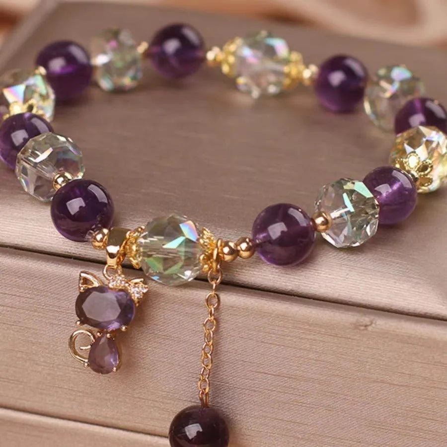 Antique style women's crystal bracelet with a nine-tailed fox pendant and a natural purple amethyst flower charm.