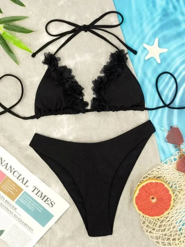 Black women's two-piece bikini set with a gathered swim top and matching shorts.
