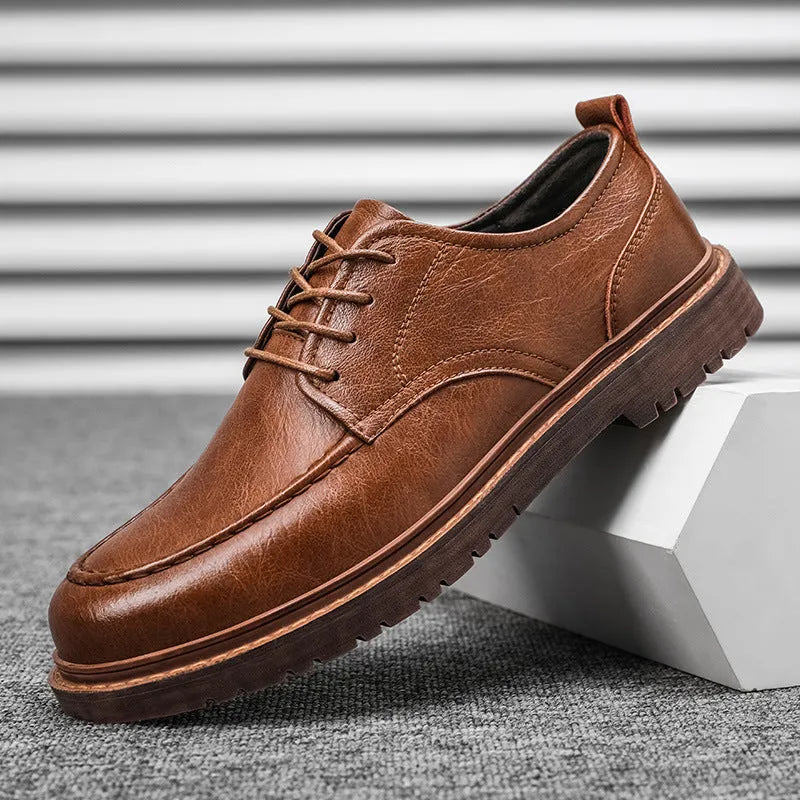 Black and brown tooling casual leather shoes with round toe and flat rubber sole