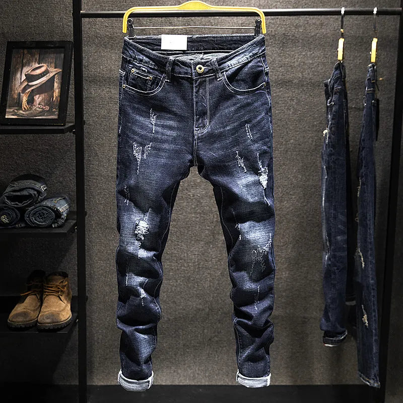 Men's slim-fitting denim jeans in dark blue and light blue colours showing micro-elasticity and mid-waist design