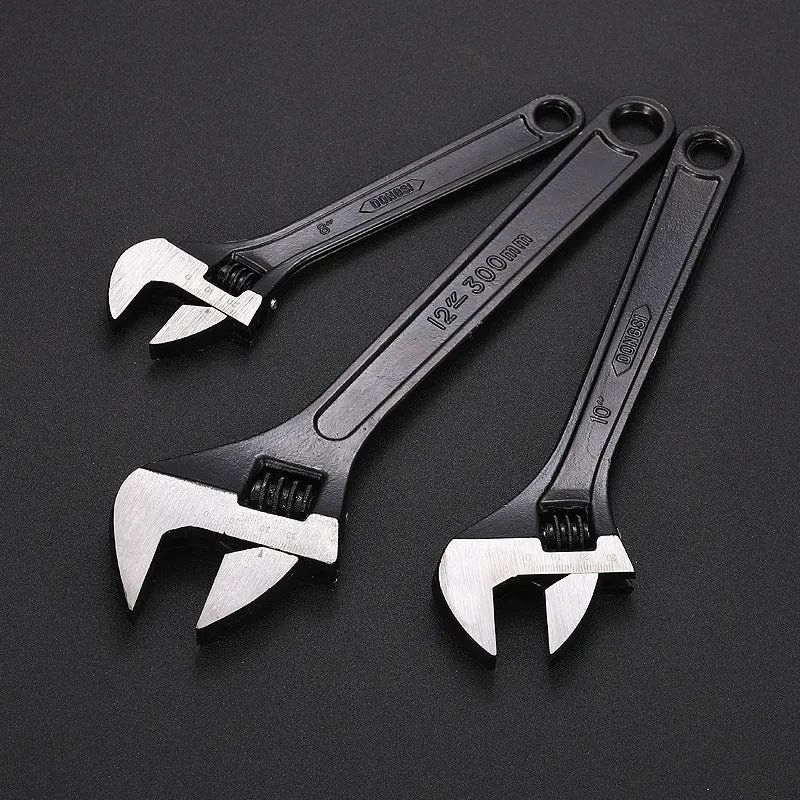 Stainless steel adjustable wrench with blackening treatment, ergonomic handle, and adjustable jaw for bolts up to 49mm