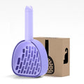 White ABS plastic cat litter scoop standing on a matching storage base with integrated waste bag roll.