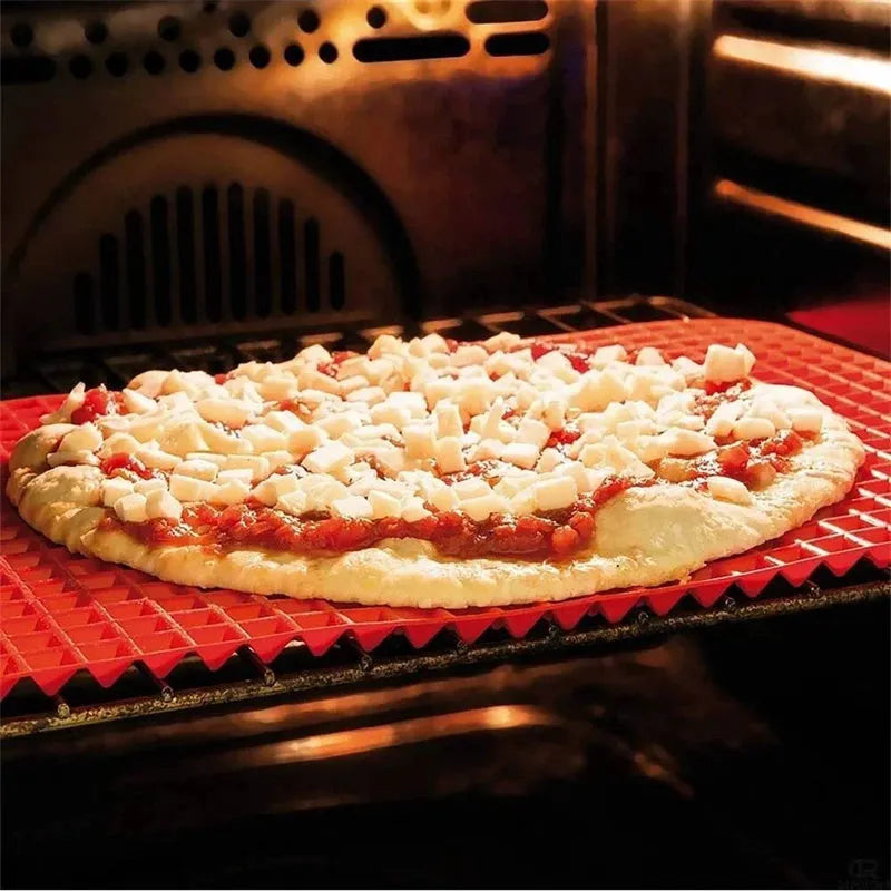 Red silicone pyramid cooking mat with grid pattern for oven and BBQ use