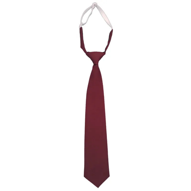 Navy blue solid colour cotton men's tie with arrow style design on a white background.