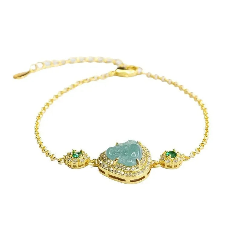 Close-up of a blue water Maitreya Buddha jade bracelet with inlaid details.