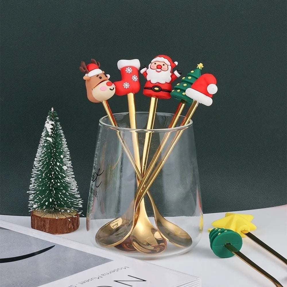 Red-handled Christmas spoon and fork set with tree, snowman, Santa, reindeer and stocking designs