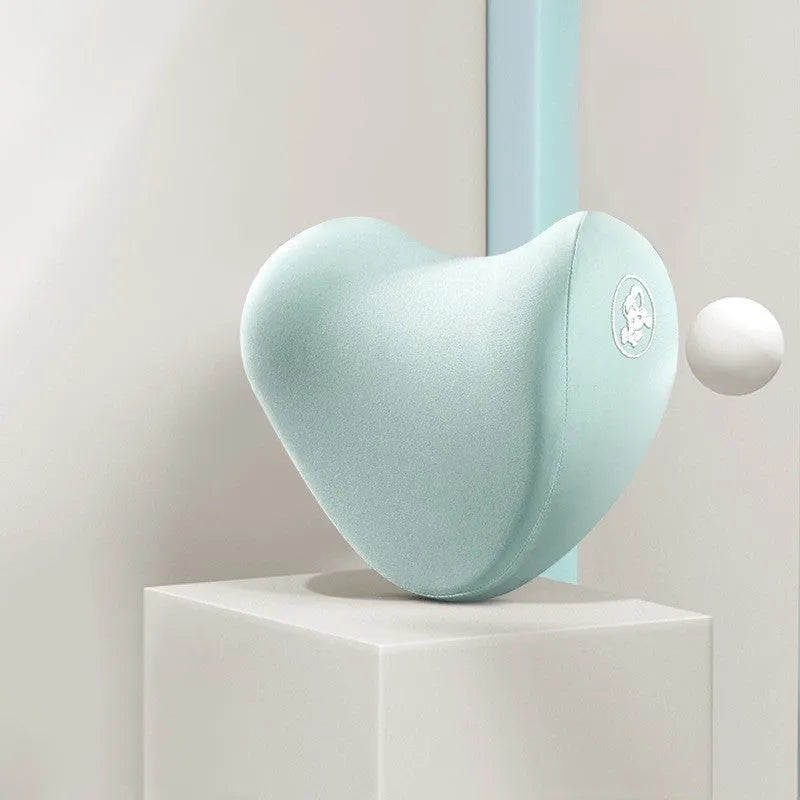 Heart-shaped black and grey car pillow set for headrest and lumbar support on a car seat.