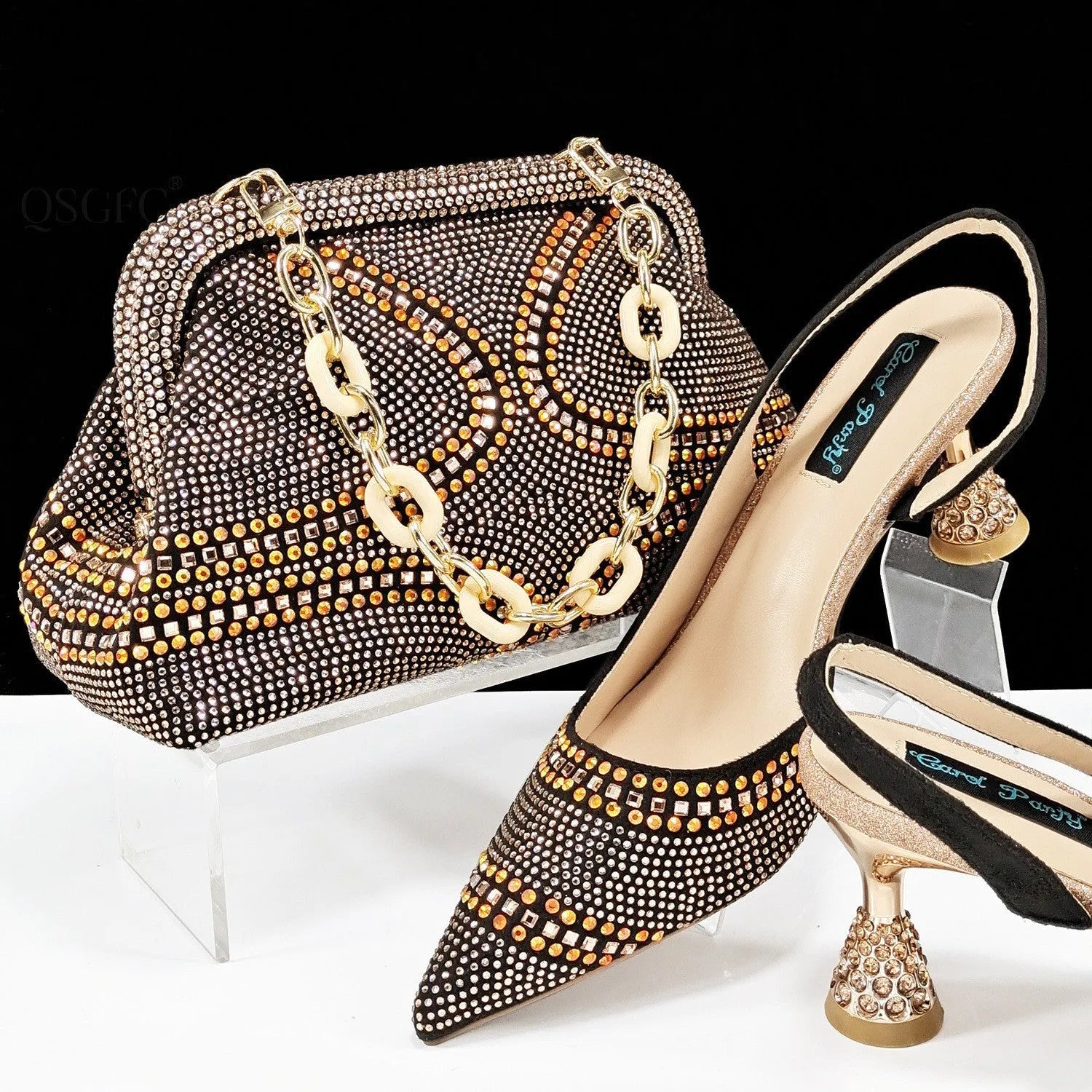 Women's pointed toe high heels with rhinestone detailing and matching small bag in blue colour