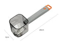 Creative stainless steel kitchen peeler with a coloured PP handle on a white background.