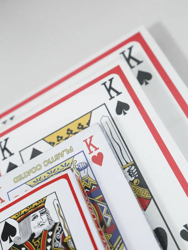 Oversized playing cards showing four, six, and nine times size options compared to standard cards