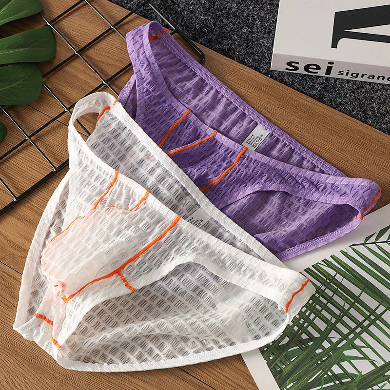 Men's solid colour low waist lace briefs for sports in white, black, green, rose red, and light purple.