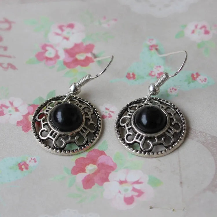 Handmade Miao silver turquoise geometric earrings with flower disk shape and totem patterns
