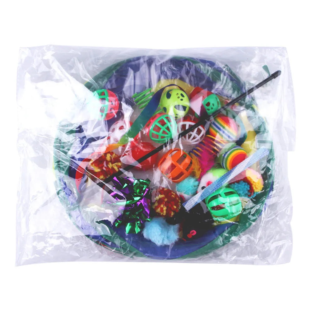 Plastic cat play channel toy with assorted accessories for feline batting and chasing