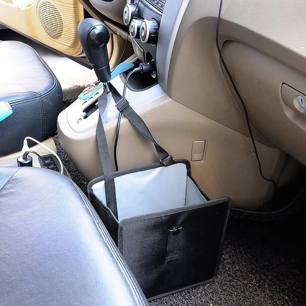 Black Oxford cloth car hanging trash can with hanging loops, shown unfolded.