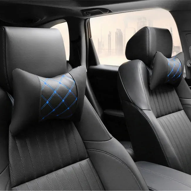 Black quilted car headrest with diamond pattern and contrasting stitching for cervical neck support