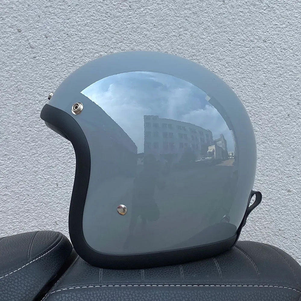 FRP motorcycle half helmet with retro design shown in Cement Gray colour, suitable for electric motorcycle commuting