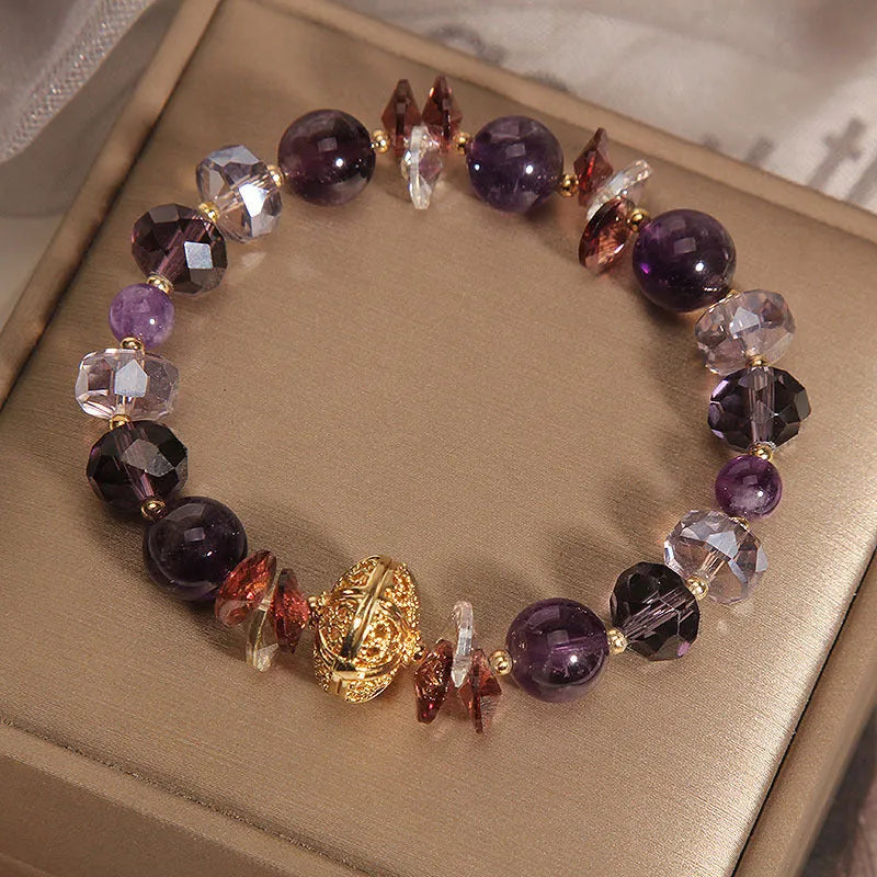 Purple crystal bracelet with pumpkin beads and rhinestone details for women
